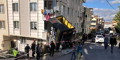 İşçilerle birlikte bina bahçesine uçtu