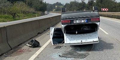 Otomobil takla atıp ters durdu