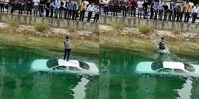 Sürücü halatla kurtarıldı