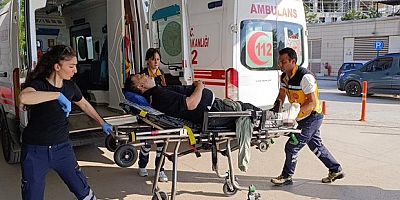 Üzerine iş makinesi devrilen işçi yaralandı