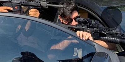 Uzun namlulu silahlarla çektiği fotoğraflar ortaya çıktı