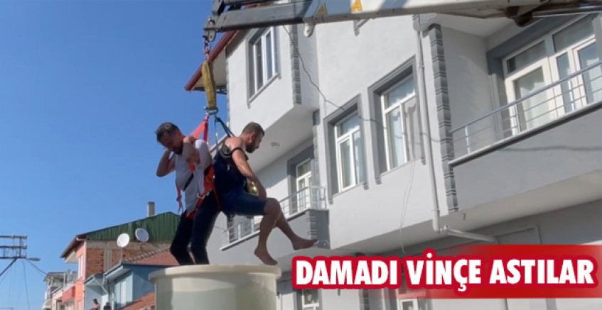 Damadı vinçe astılar
