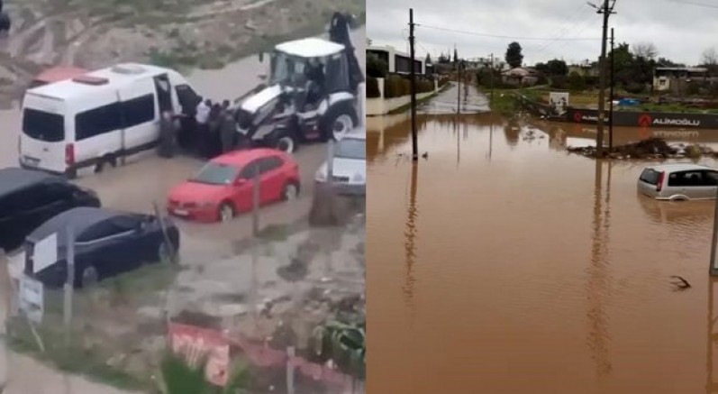 Minibüste mahsur kalanlar kepçe yardımıyla kurtarıldı